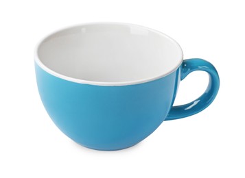 Photo of Light blue ceramic cup isolated on white