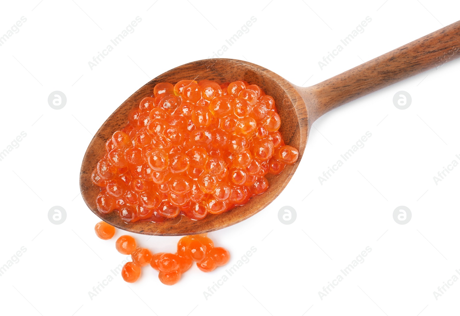 Photo of Wooden spoon and delicious red caviar isolated on white, top view