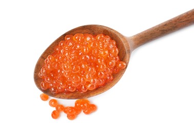 Photo of Wooden spoon and delicious red caviar isolated on white, top view