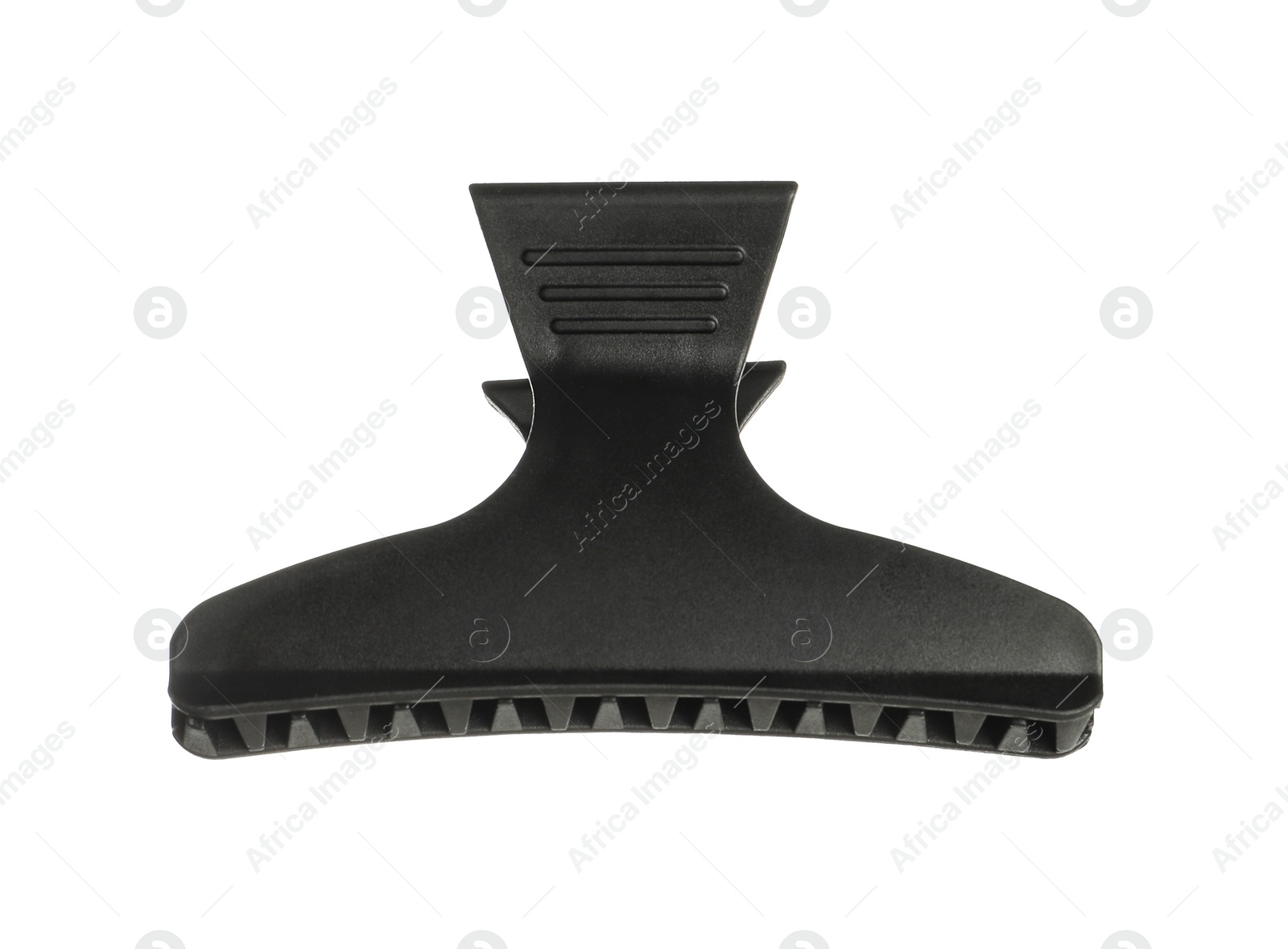 Photo of Hairdresser tool. Black hair clip isolated on white