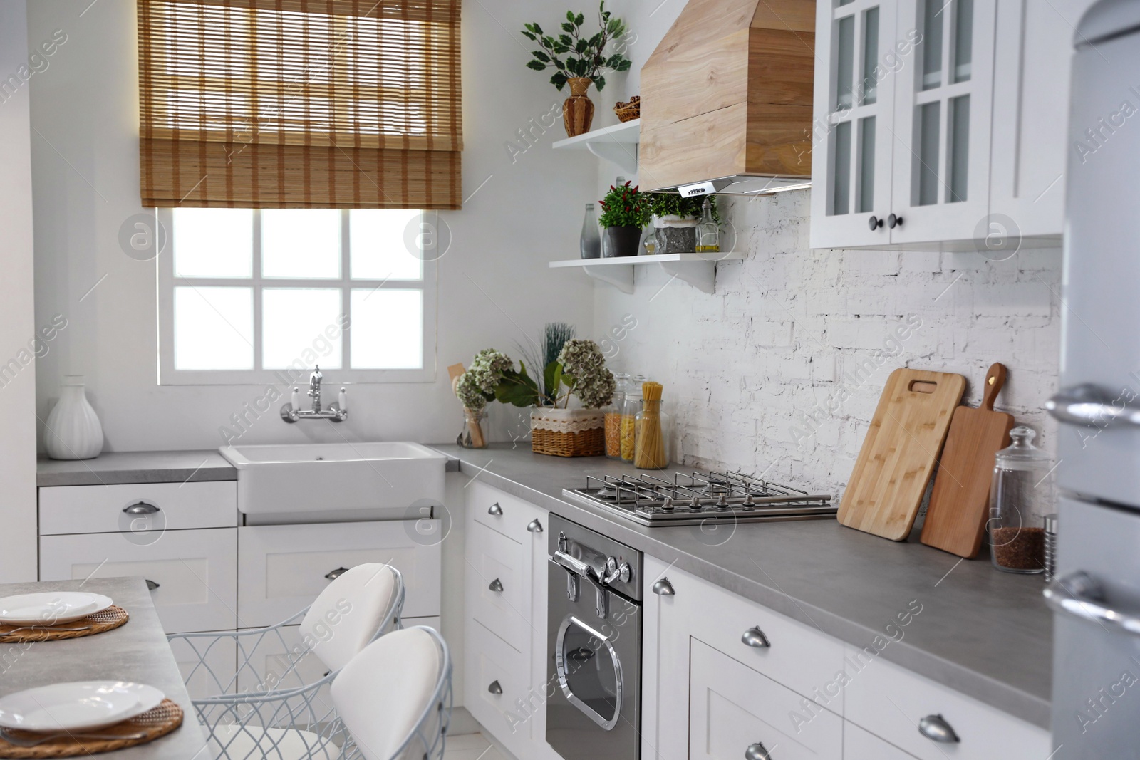 Photo of Beautiful kitchen interior with new stylish furniture