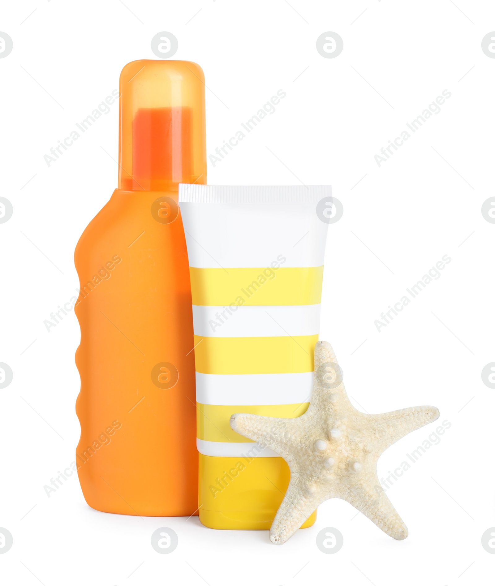 Photo of Different suntan products and starfish on white background