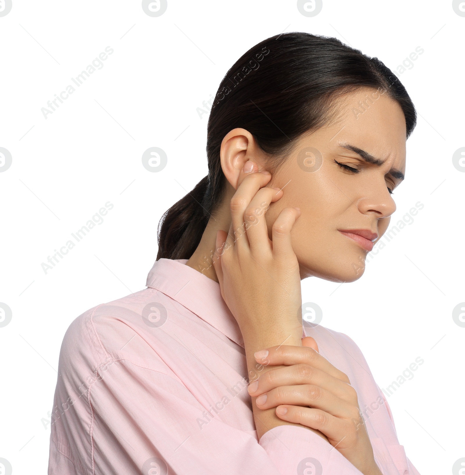 Photo of Young woman suffering from ear pain on white background