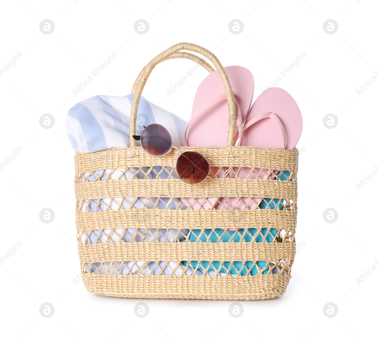 Photo of Bag with beach accessories on white background