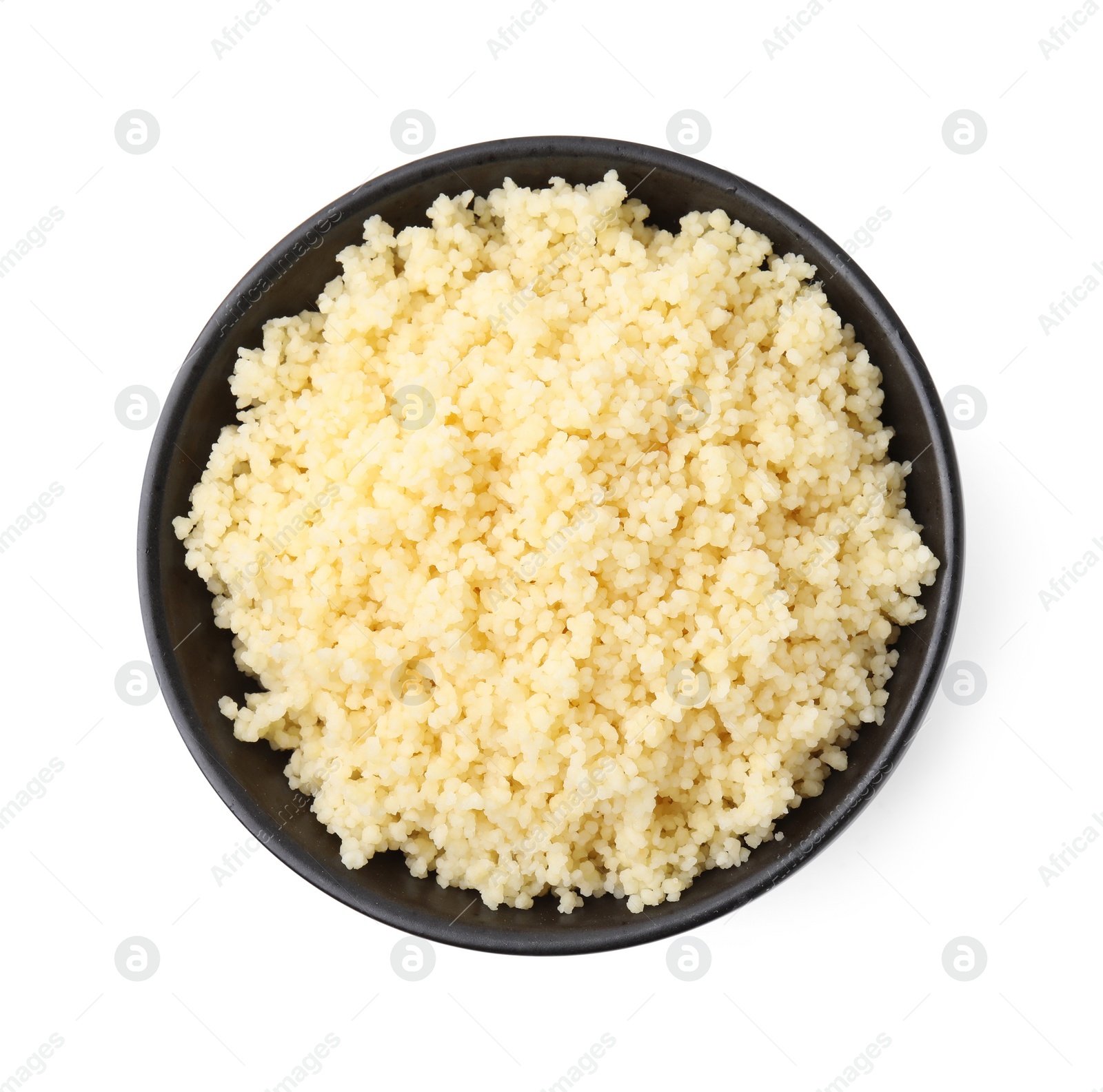 Photo of Tasty couscous in bowl isolated on white, top view