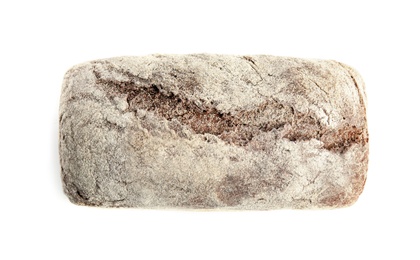 Loaf of fresh bread on white background, top view