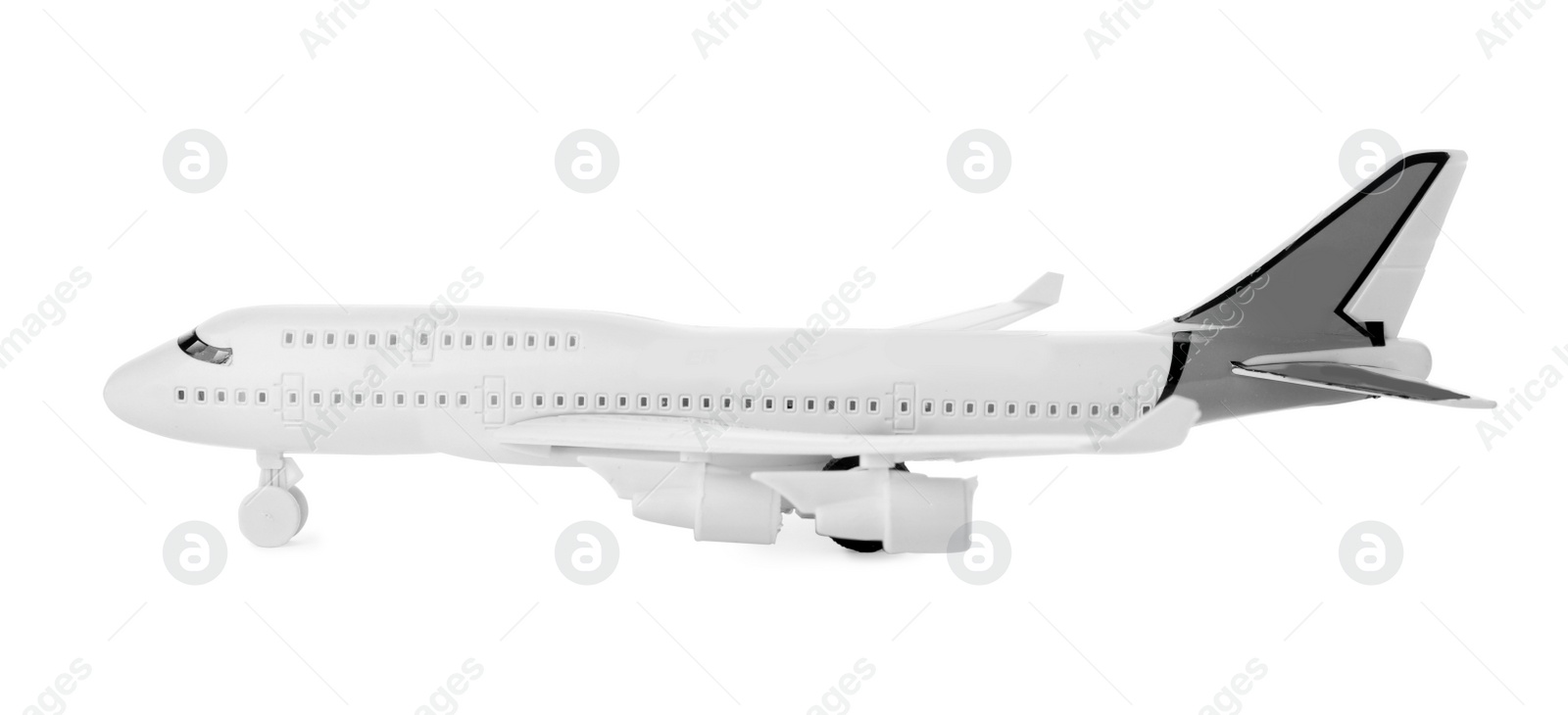 Photo of Toy plane isolated on white. Logistics and wholesale concept