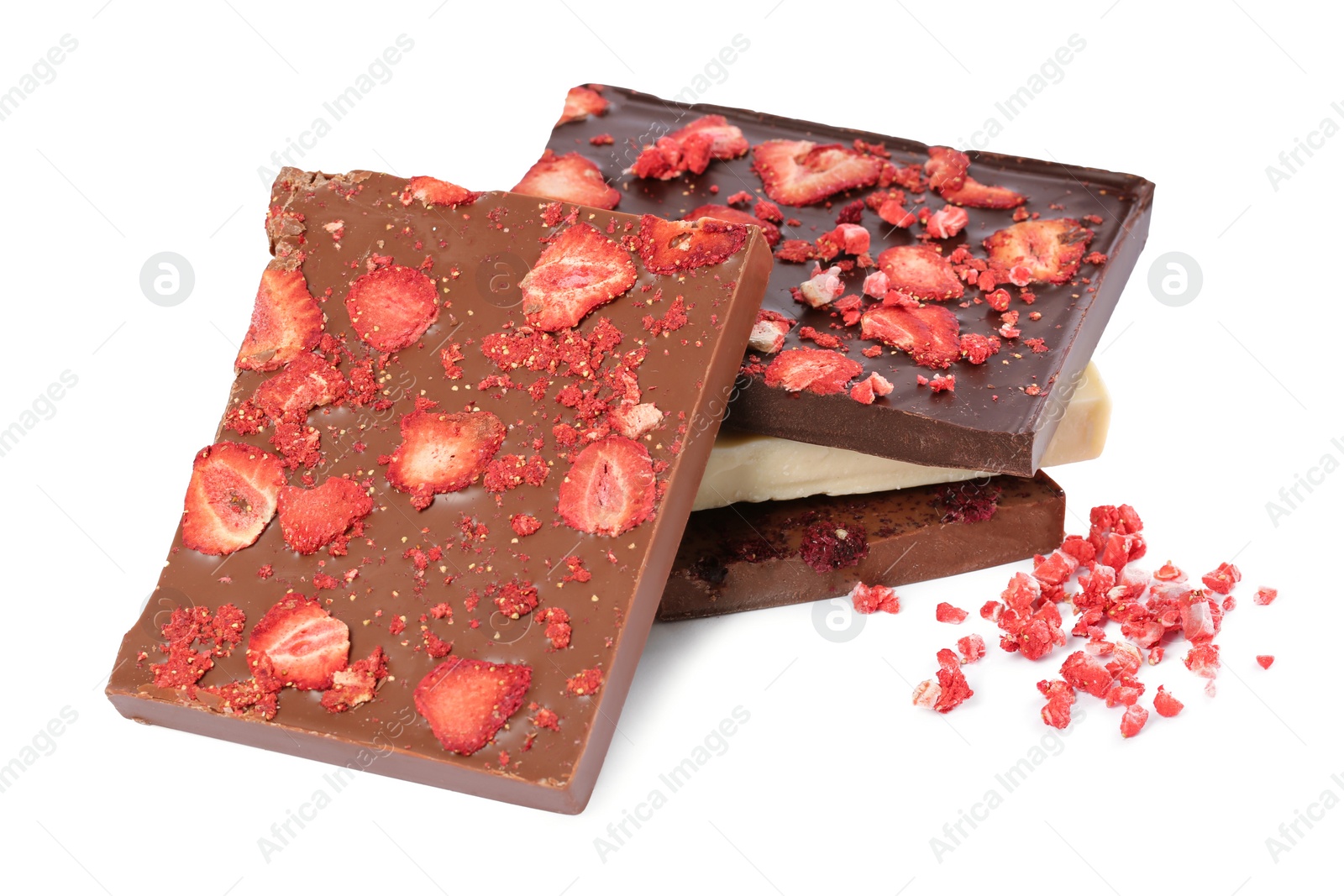 Photo of Chocolate bars with freeze dried strawberries on white background