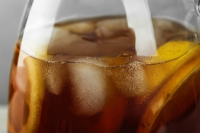 Glassware of delicious refreshing iced tea, closeup