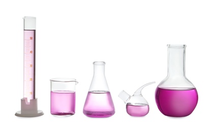 Photo of Laboratory glassware with purple liquid on white background