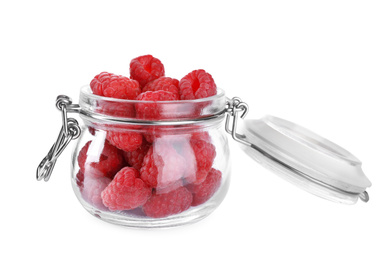 Delicious fresh ripe raspberries in glass jar isolated on white