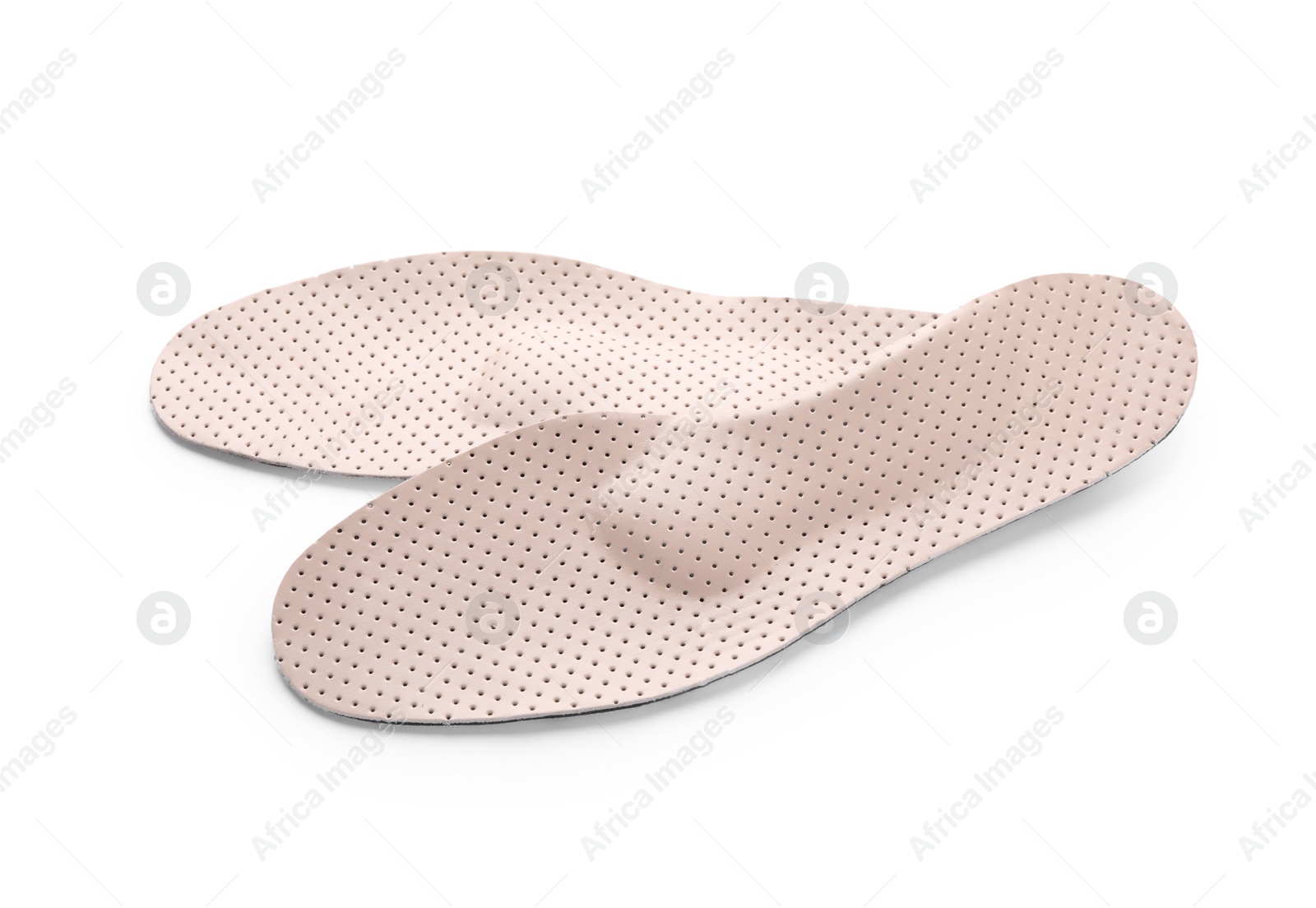 Photo of Beige comfortable orthopedic insoles isolated on white