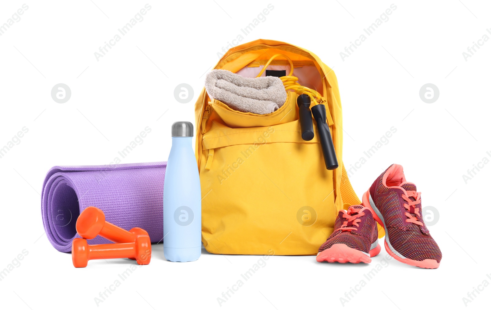 Photo of Backpack with sports equipment on white background