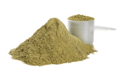 Hemp protein powder and measuring scoop on white background