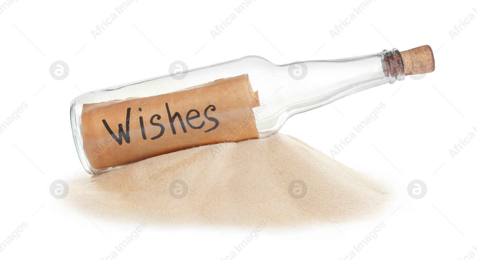 Photo of Wish list in corked glass bottle with sand isolated on white