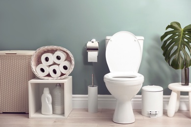 Photo of Bathroom interior with new ceramic toilet bowl