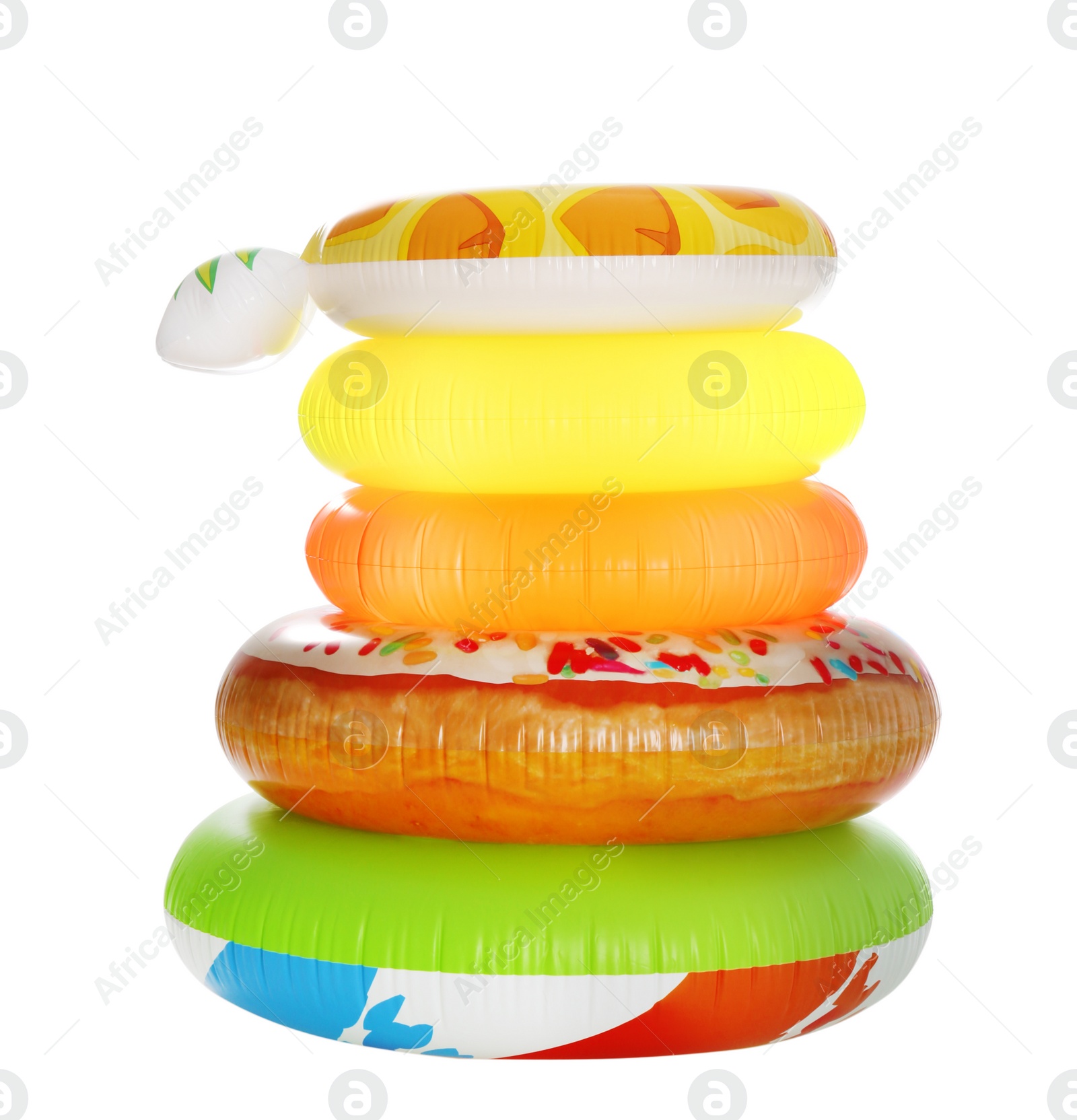 Photo of Stack of colorful inflatable rings isolated on white