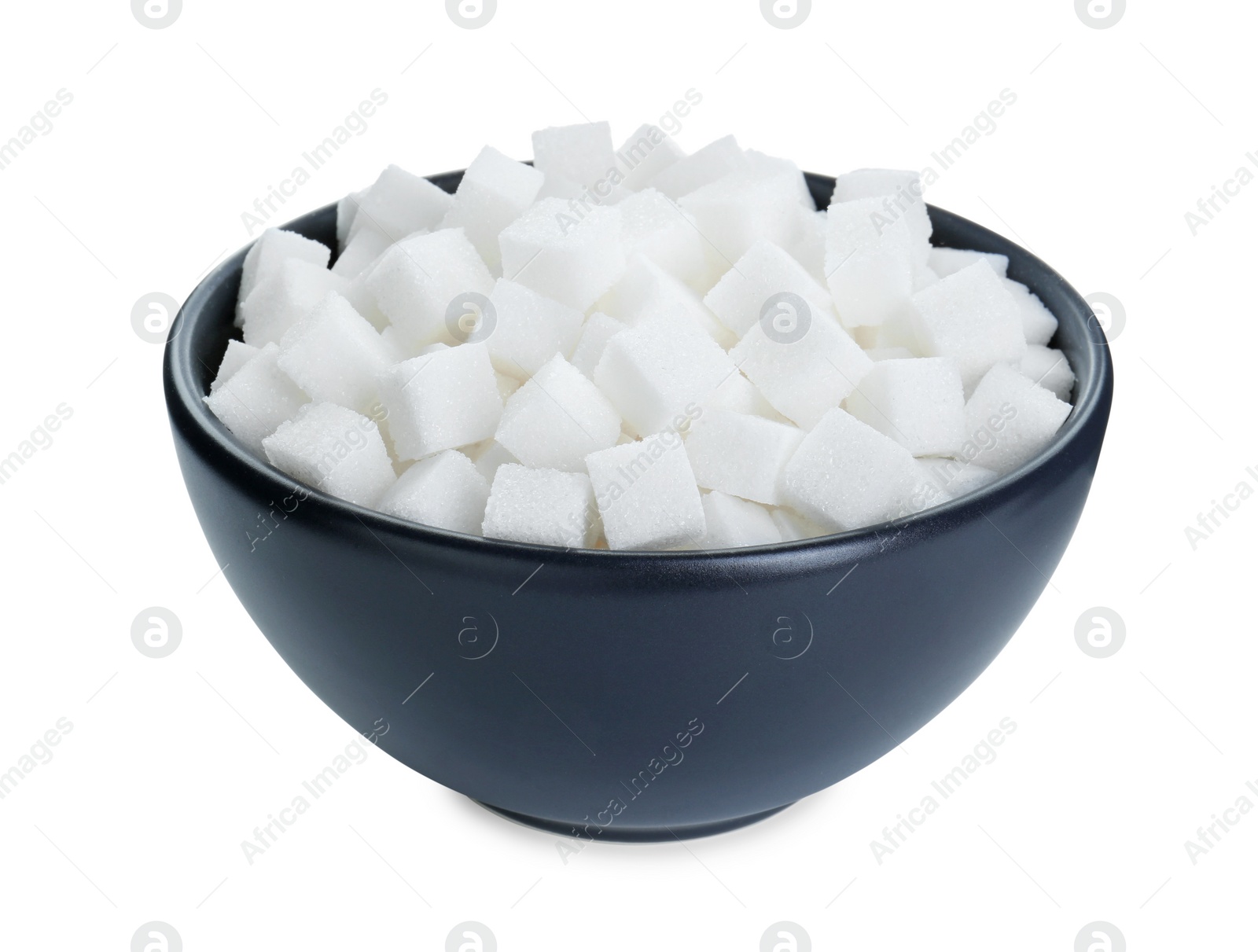 Photo of Sugar cubes in bowl isolated on white