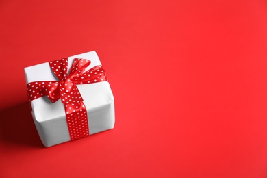 Photo of Beautiful gift box on color background