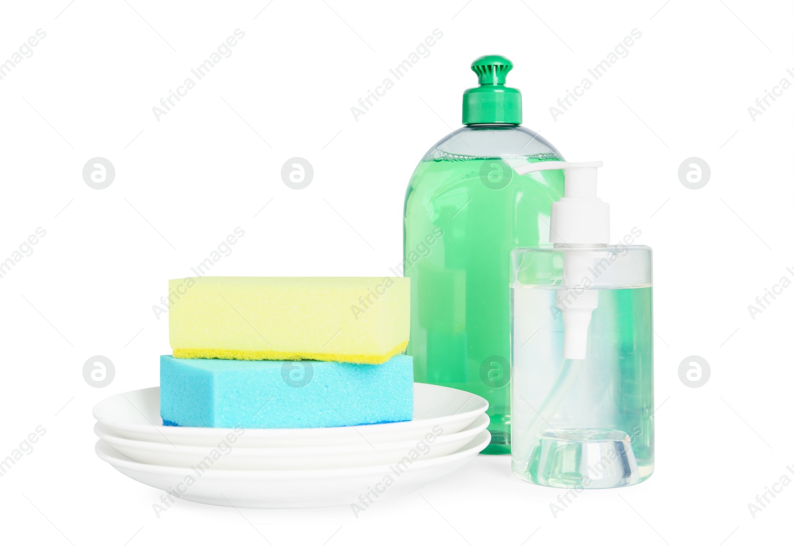 Photo of Detergents, plates and sponges on light background. Clean dishes