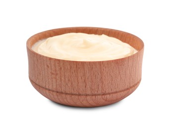 Photo of Tasty mayonnaise in wooden bowl isolated on white