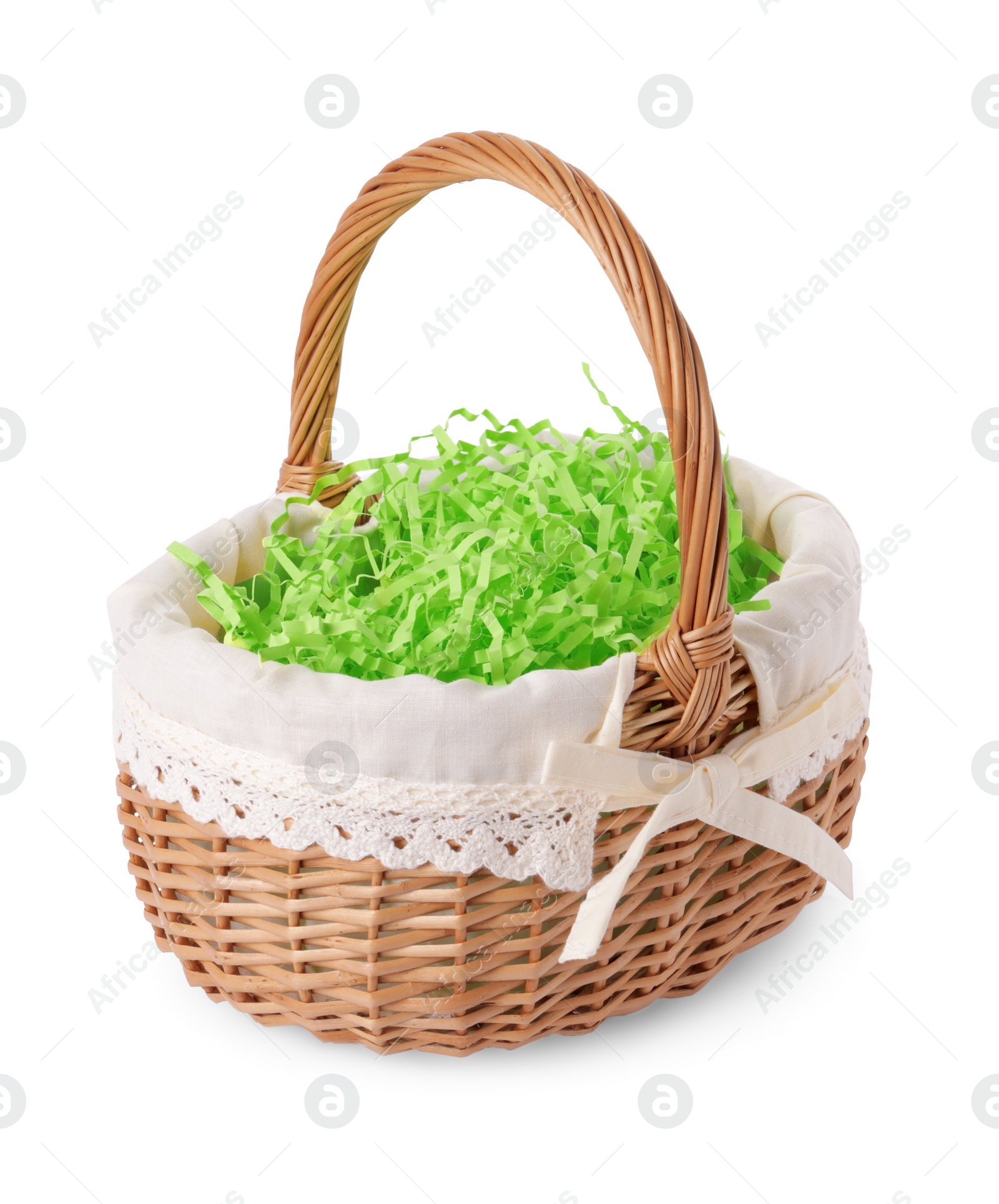 Photo of Easter wicker basket with decorated grass isolated on white