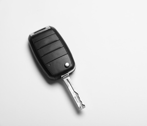 Car key on white background, top view