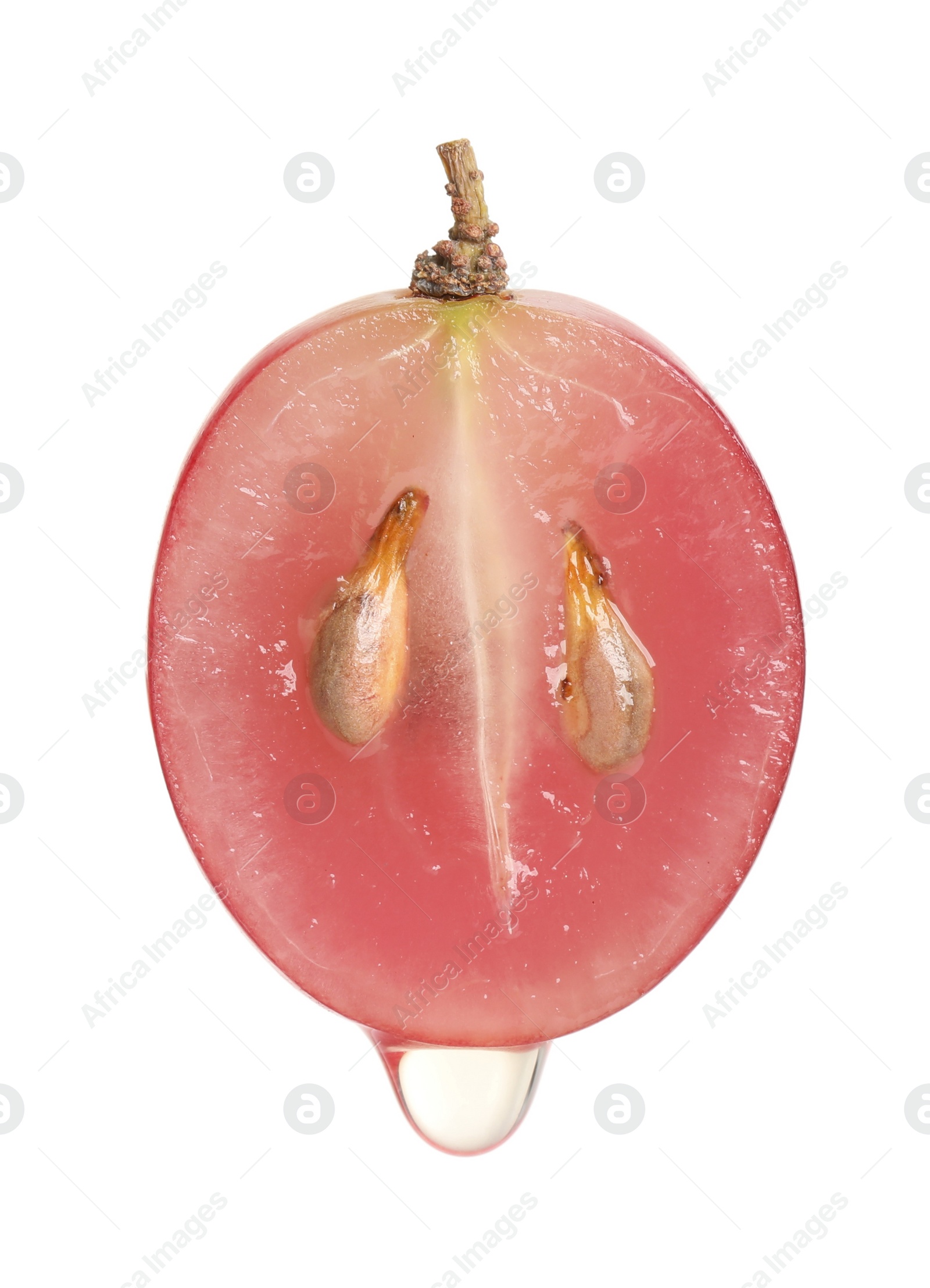 Photo of Natural grape seed oil dripping from berry on white background. Organic cosmetic