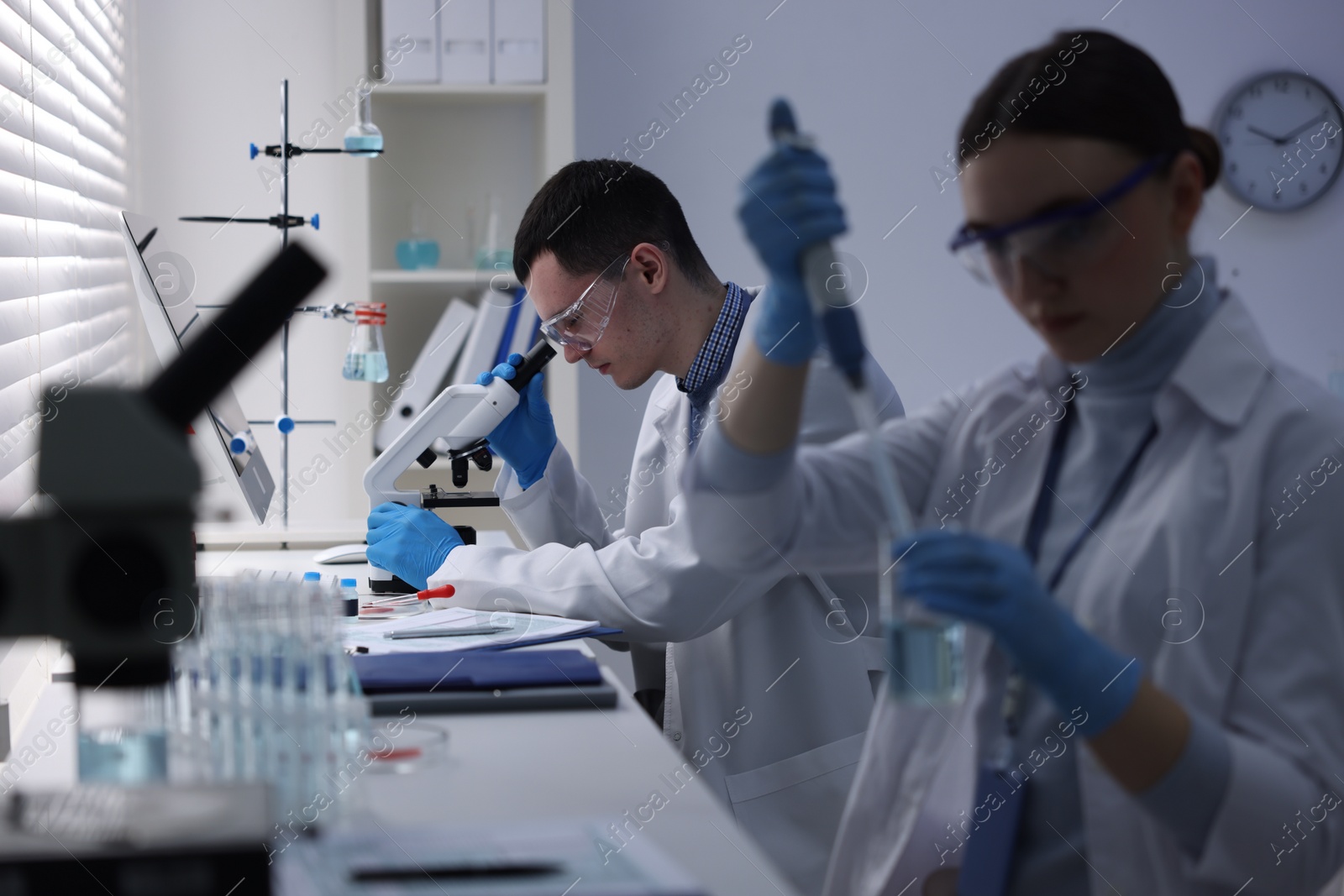 Photo of Scientists working with samples in laboratory. Medical research