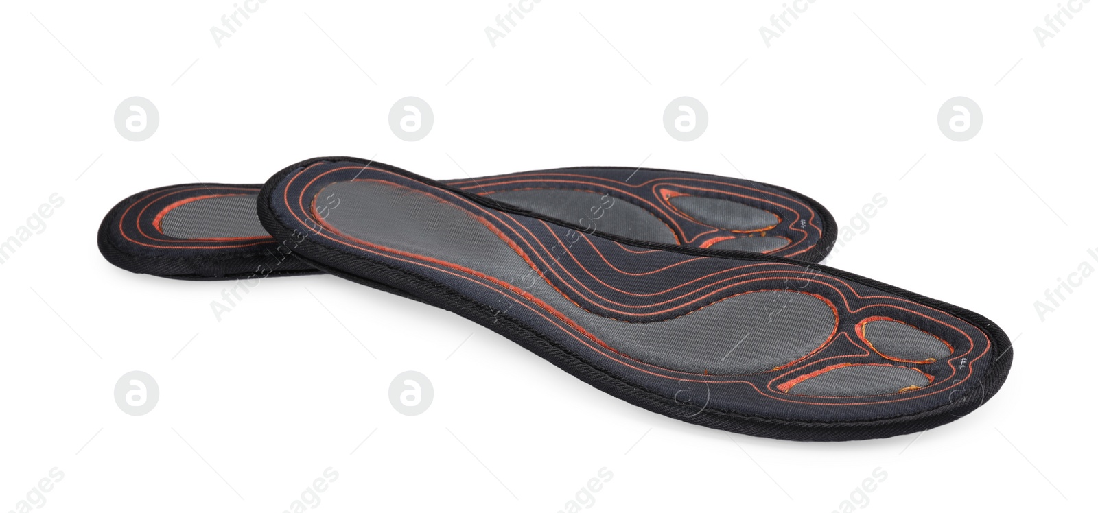 Photo of Orthopedic insoles for shoes on white background