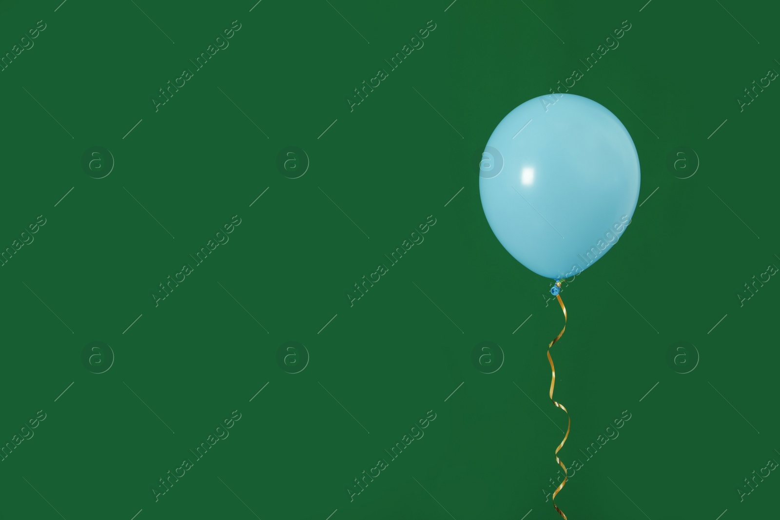 Photo of Bright balloon on color background, space for text. Celebration time