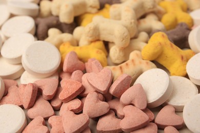 Photo of Many different vitamins for pets as background, closeup