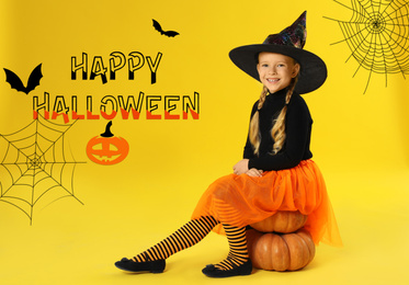 Image of Happy Halloween greeting card design. Cute little girl with pumpkins wearing witch costume on yellow background