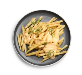 Delicious french fries with cheese sauce and dill isolated on white, top view