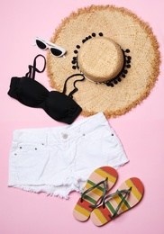 Photo of Flat lay composition with stylish bikini on color background. Beach objects