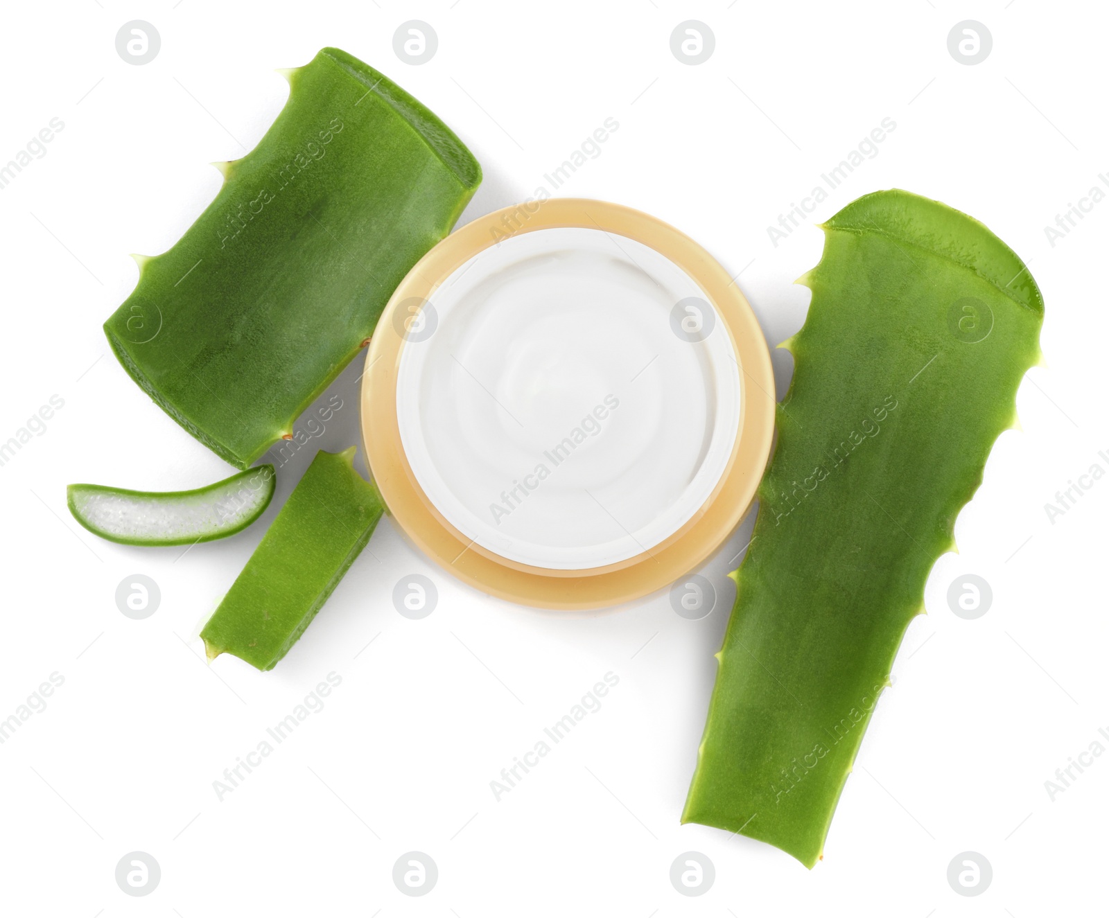 Photo of Jar of natural cream and cut aloe leaves isolated on white, top view