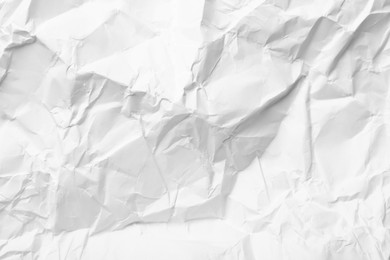 Sheet of white crumpled paper as background, closeup