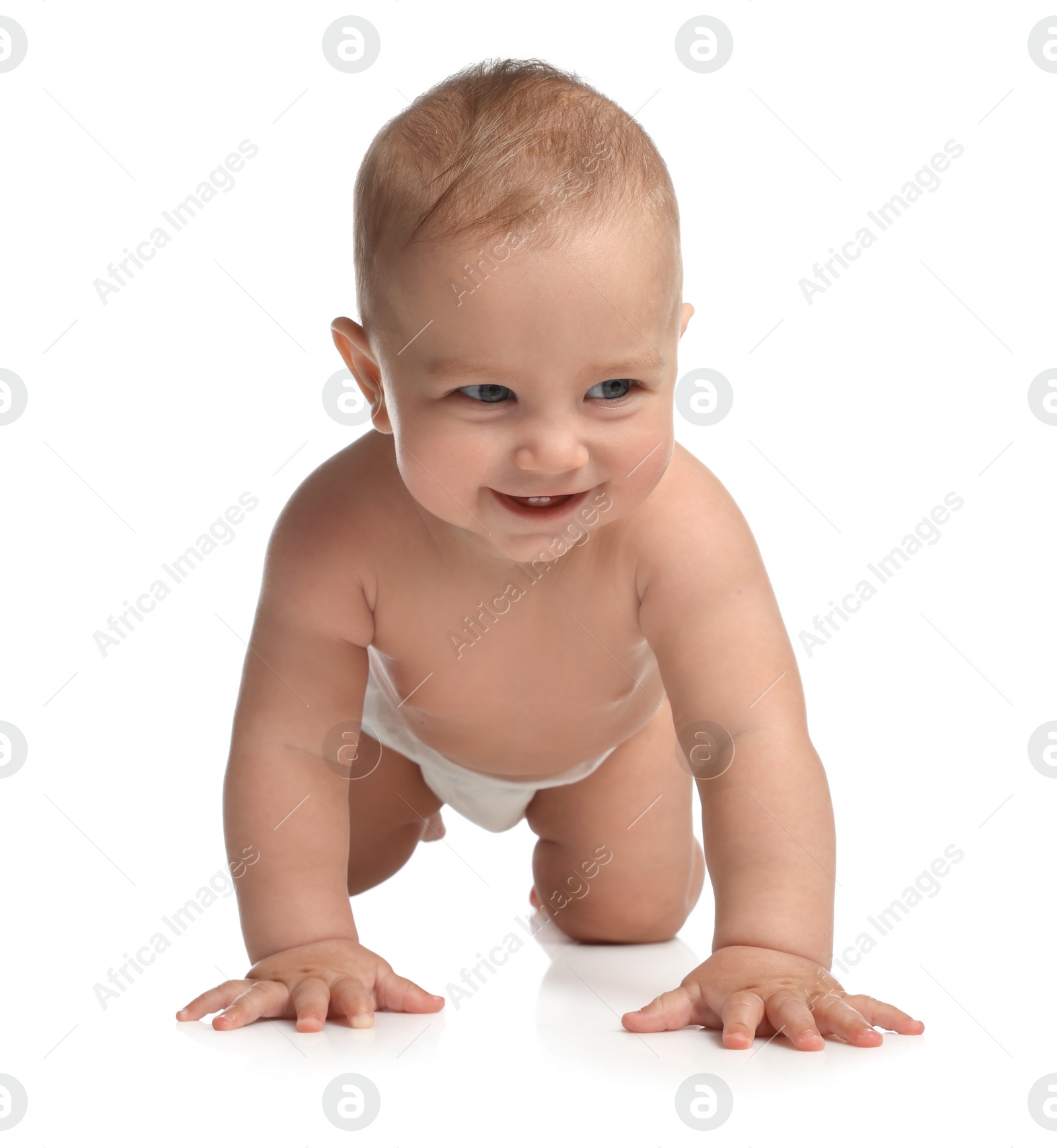 Photo of Cute little baby in diaper crawling on white background