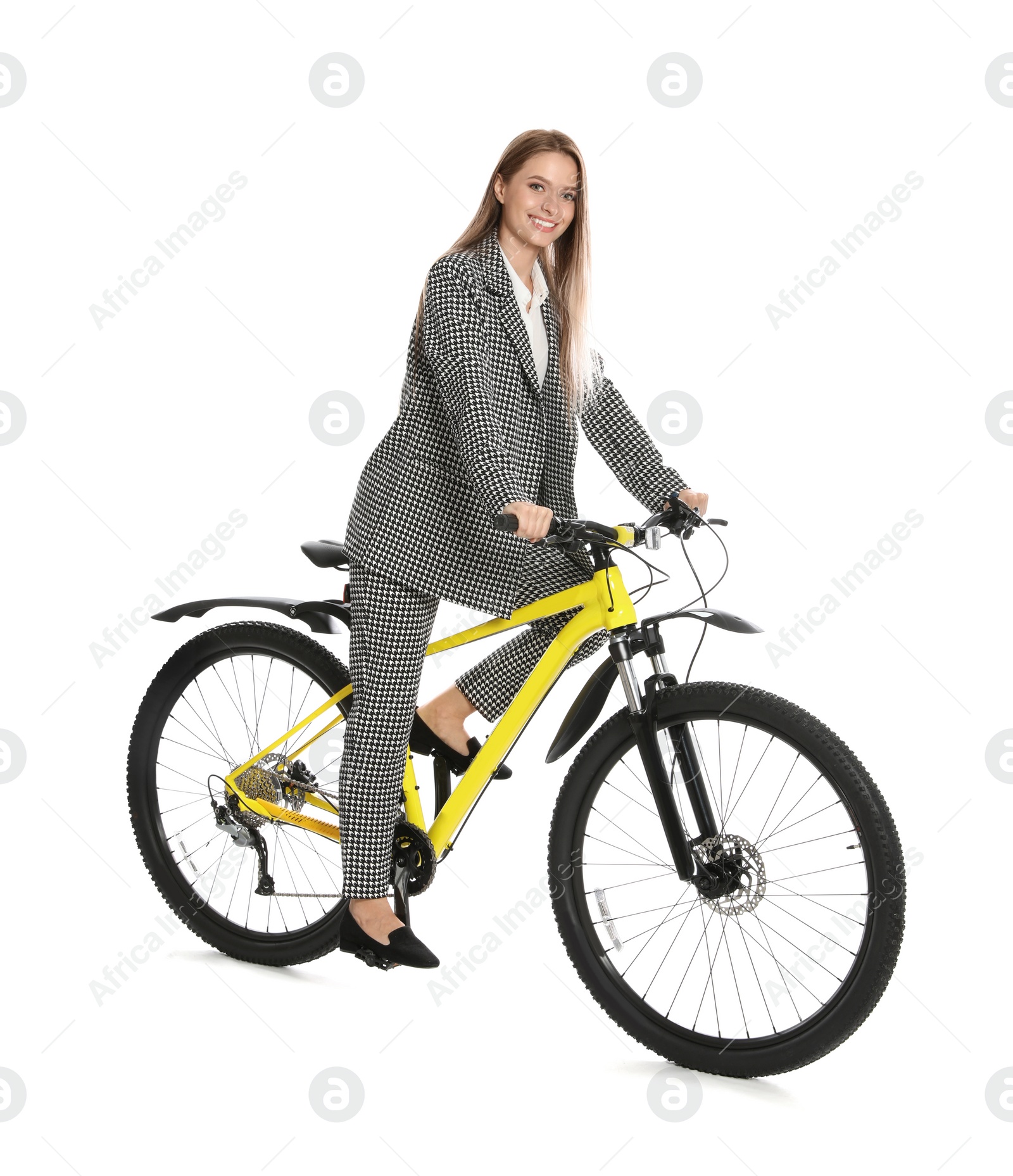 Photo of Young businesswoman with bicycle on white background