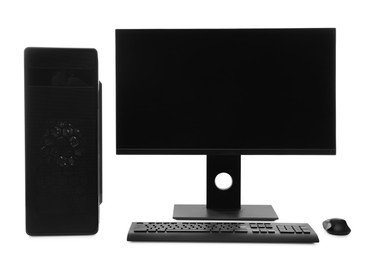 Photo of Modern computer monitor with black screen, system unit, keyboard and mouse on white background