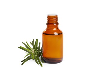 Photo of Sprig of fresh rosemary and essential oil on white background