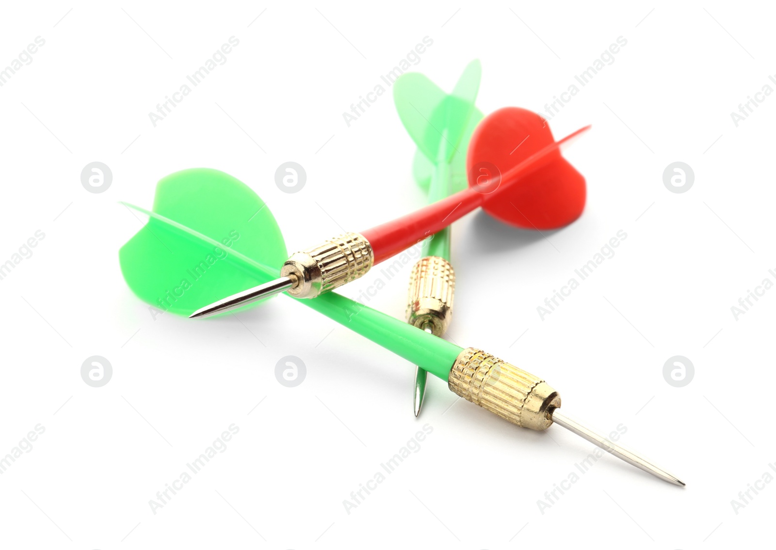 Photo of Sharp red and green darts isolated on white