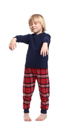 Photo of Boy in pajamas sleepwalking on white background