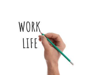 Image of Work-life balance concept. Man with pencil and words on white background, closeup
