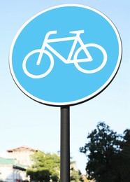 Road sign Cycleway under blue sky in city