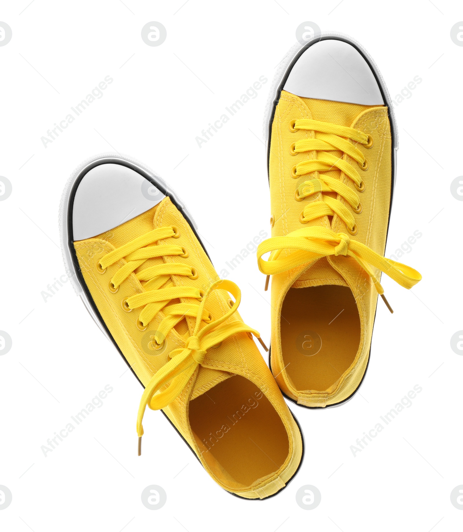 Photo of Pair of trendy sneakers isolated on white, top view