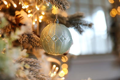 Photo of Closeup view of beautiful decorated Christmas tree indoors