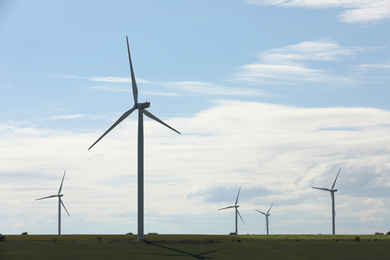 Photo of Beautiful viewfield with wind turbines. Alternative energy source