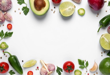 Frame of fresh guacamole ingredients on white background, flat lay. Space for text