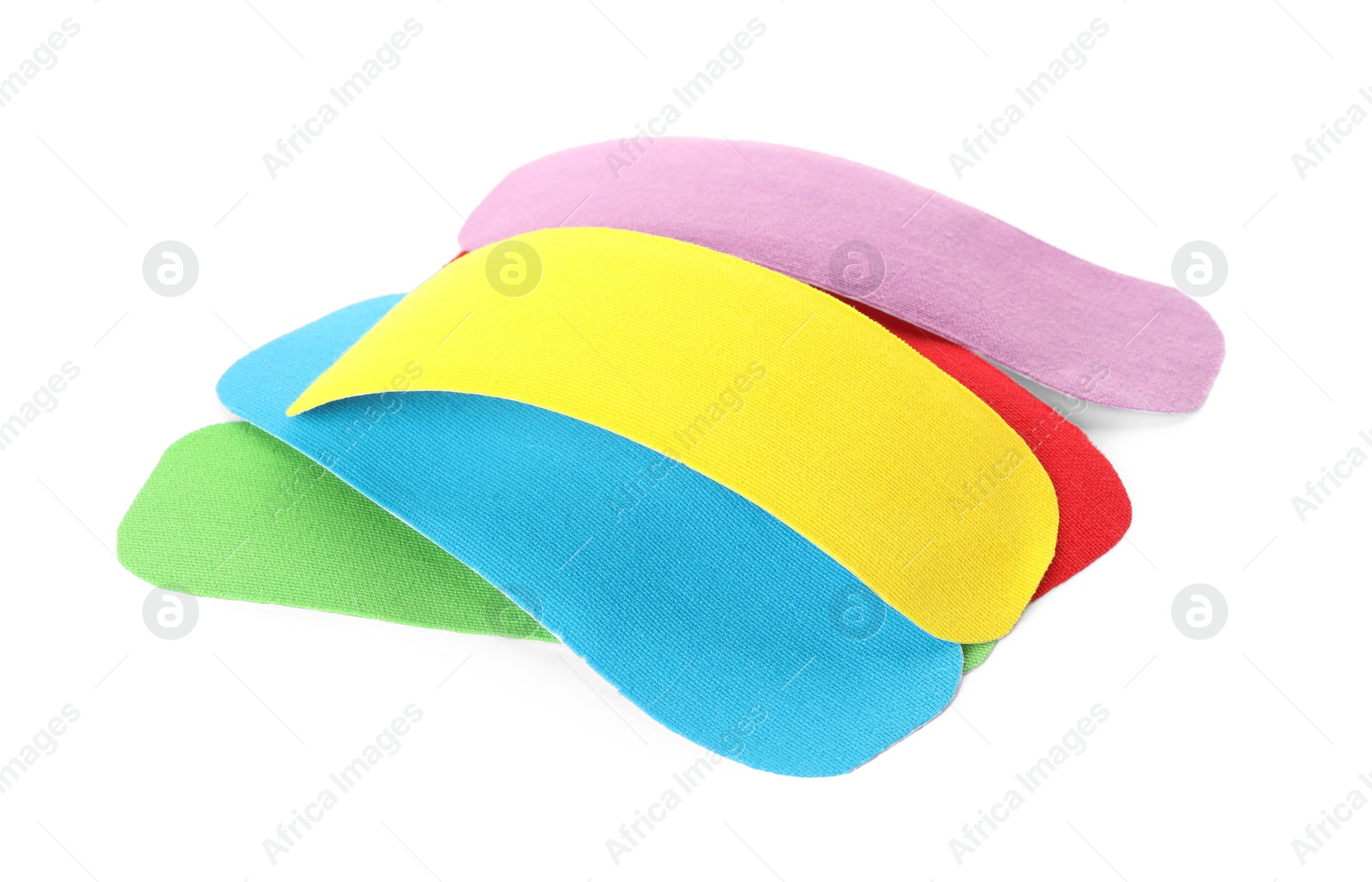 Photo of Bright kinesio tape pieces on white background